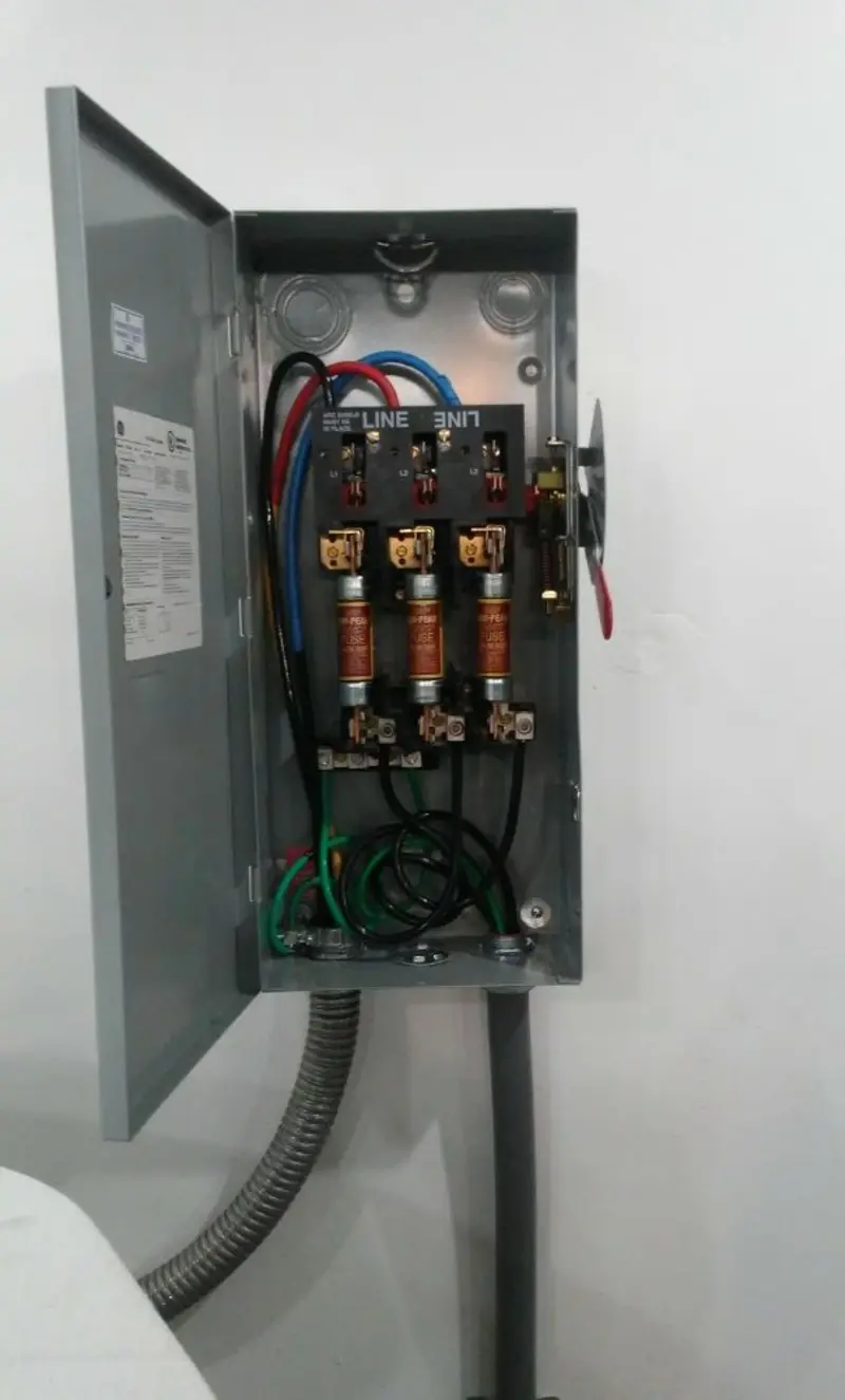 Three-phase disconnect switch installed for Smoke Detector Installation in Fairway