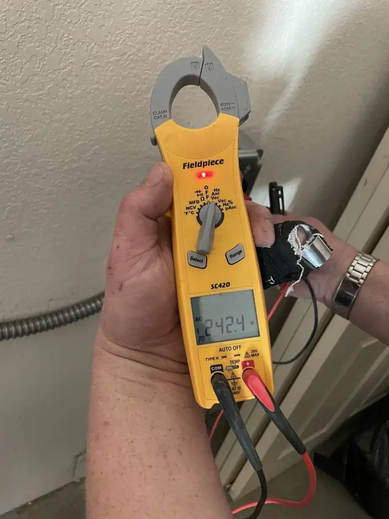 Voltage testing with clamp meter during Hot Tub / Pool Electrical Wiring in Fairway